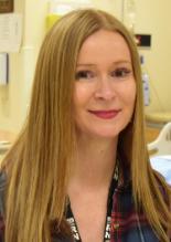 Head and shoulders image of female lab instructor